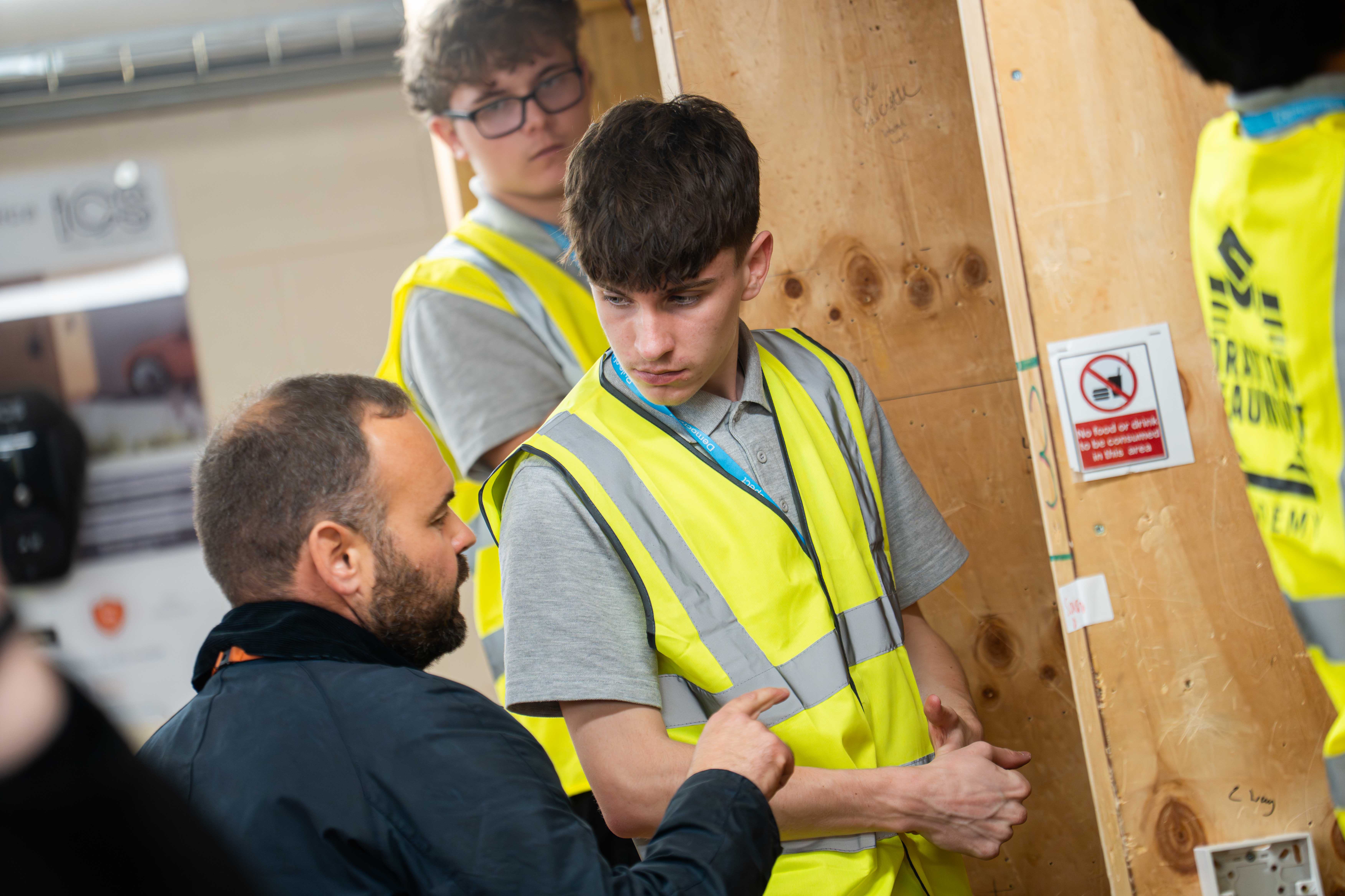 Students gaining hands-on experience in the workshop